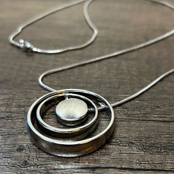 Unique Silver Tone Necklace with Circular Pendant - Picture 2 of 3